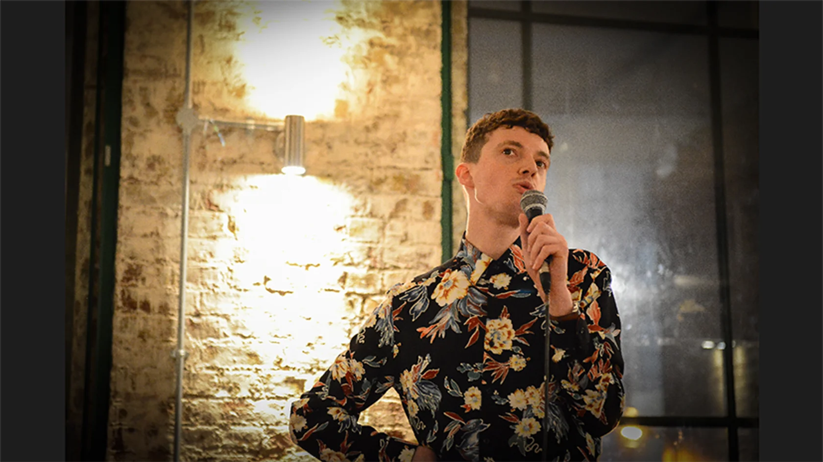 Equity variety member on stage with microphone
