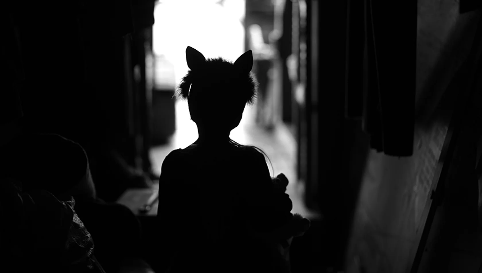 Child actor waiting at edge of stage