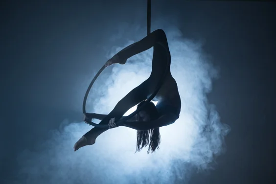 A circus performer does an aerial performance 