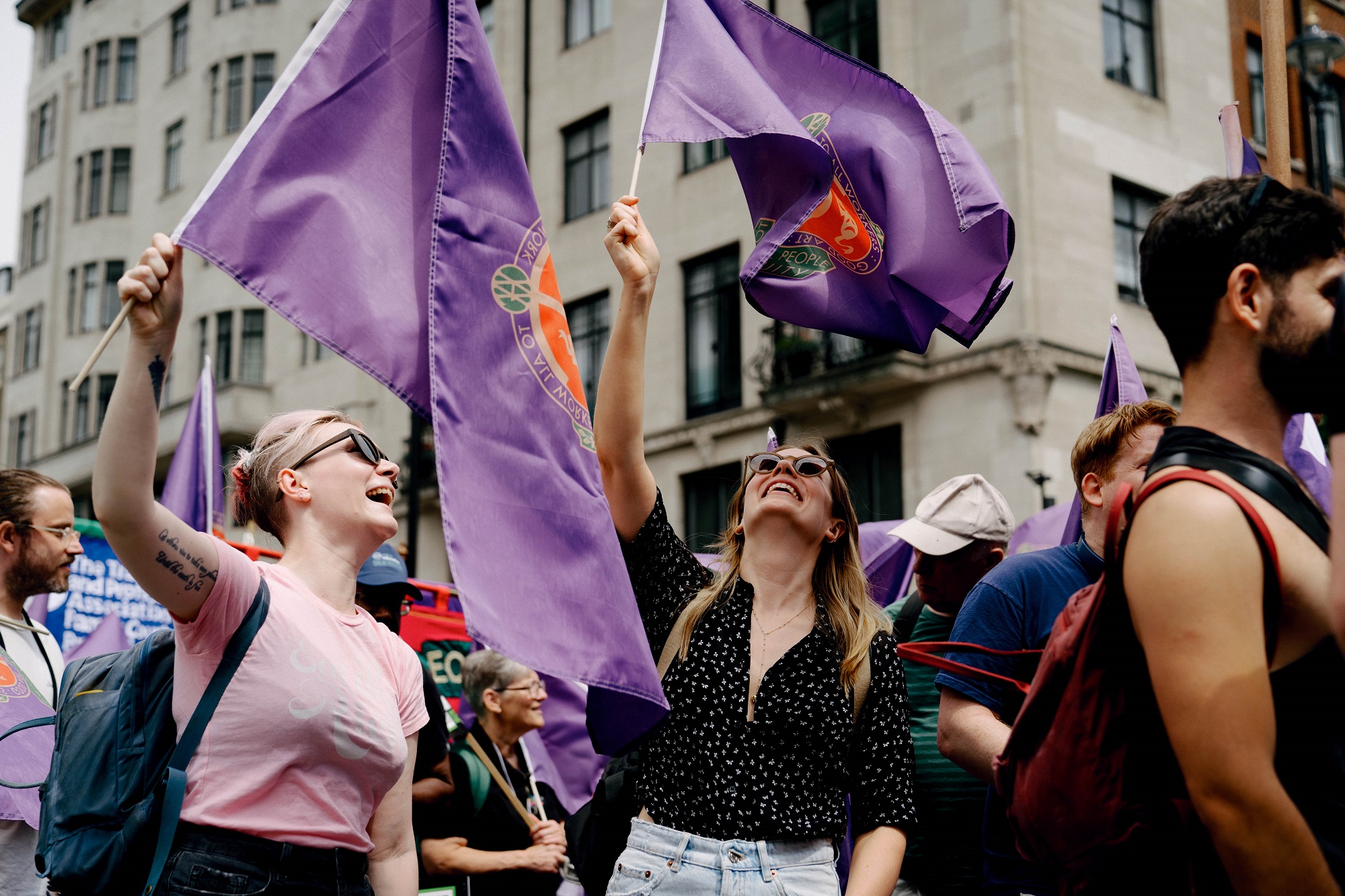 Members waving flags