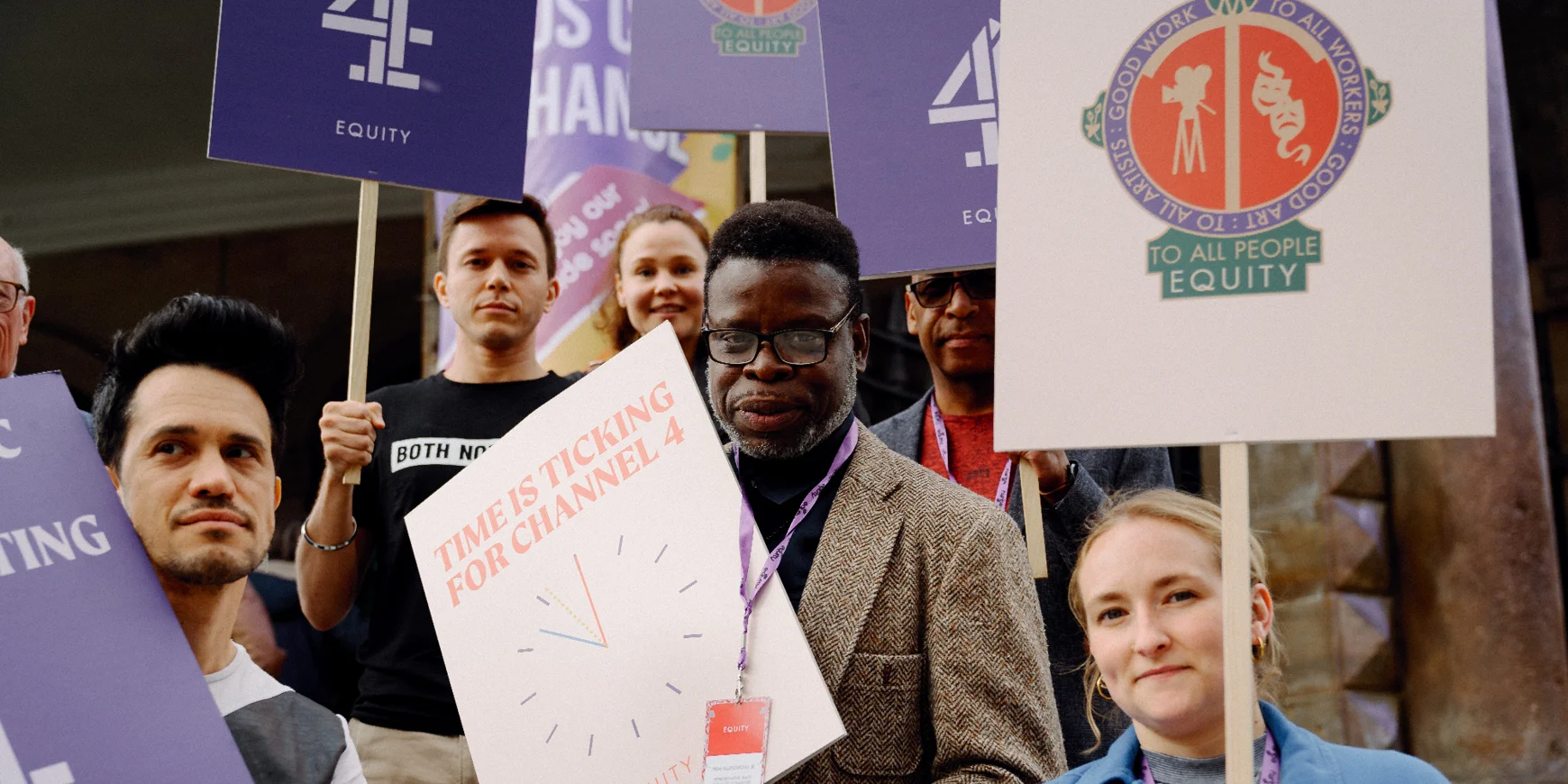 Equity members holding signs in support of Channel 4 at a rally to keep Channel 4 public