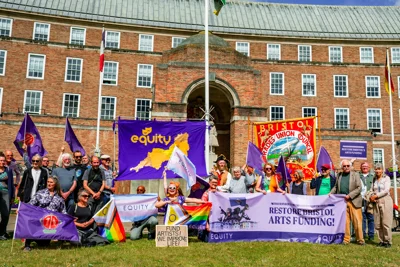 Stop the Cuts rally in Bristol with flags and banners