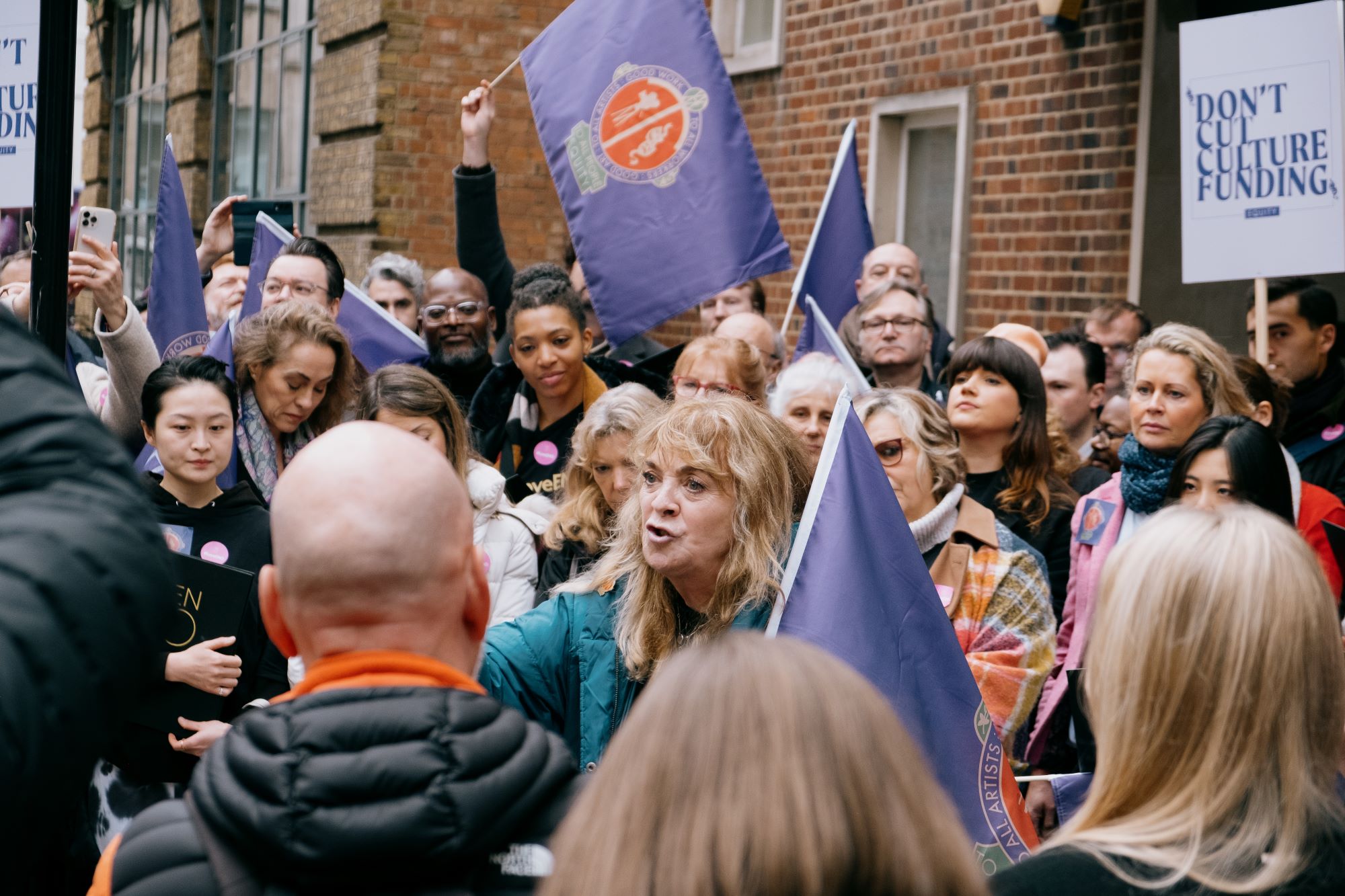 photo shows Lynda Rooke (Equity President, and Class Network member) at the demonstration against the removal of Arts Council England (ACE) funding