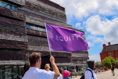 Equity flag fluttering in the wind